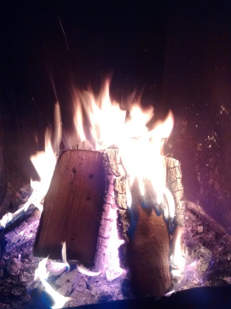 Fire logs aflame